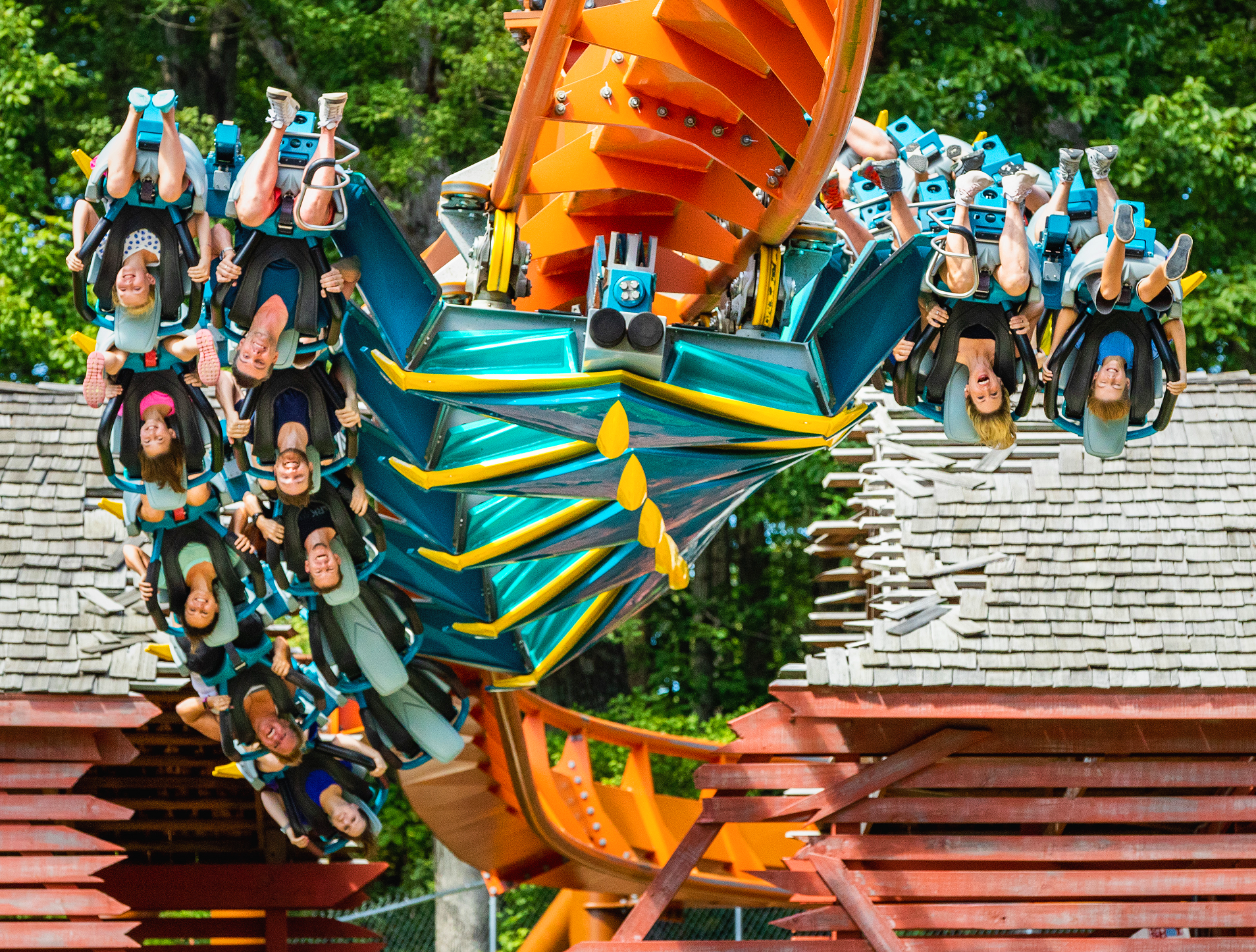 Riders flip upside down in an inline roll on Thunderbird