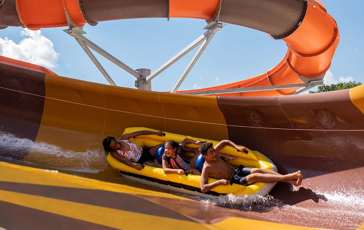 A single boat sliding through a Flying Saucer turn on Cheetah Chase Water Coaster at Holiday World & Splashin' Safari in Santa Claus, Indiana.