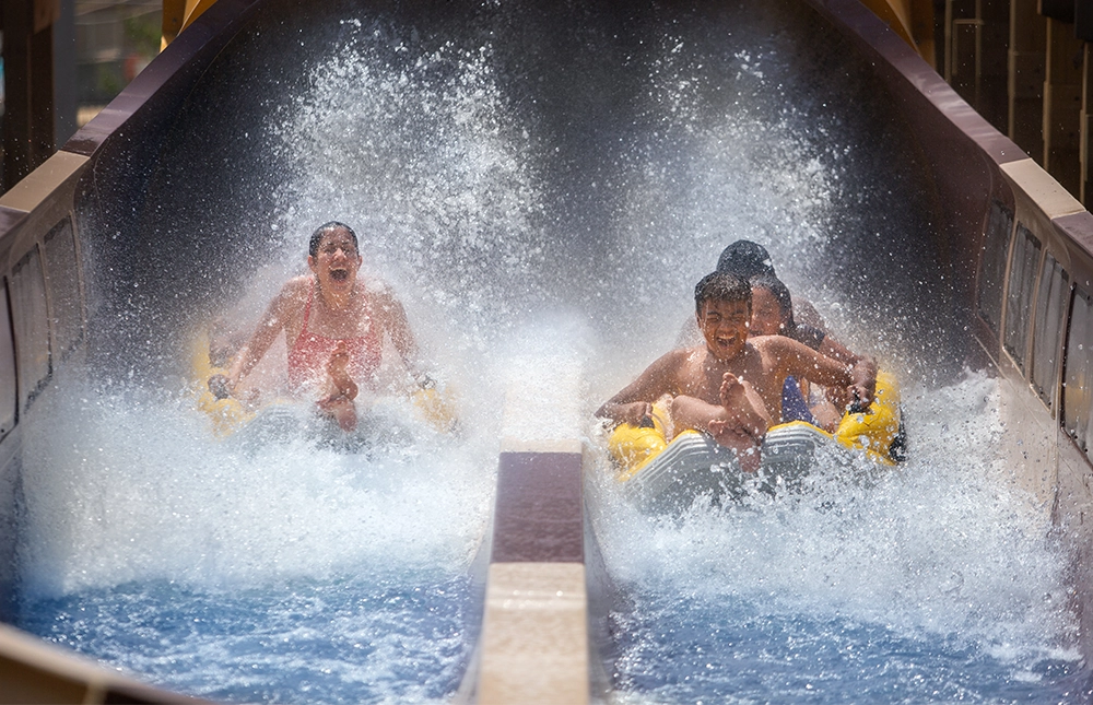 Two boats racing to the finish on Cheetah Chase water coaster at Holiday World & Splashin' Safari in Santa Claus, Indiana.