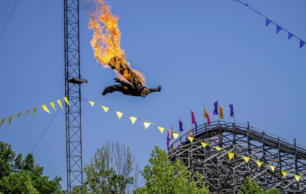 Fire Diver jumps with the Legend in the background