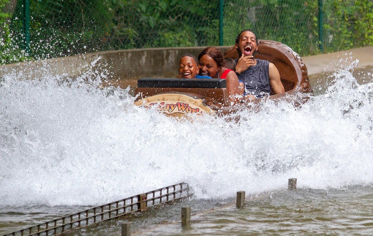 A family laughs through the splash of Frightful Falls at Holiday World & Splashin' Safari in Santa Claus, Indiana.