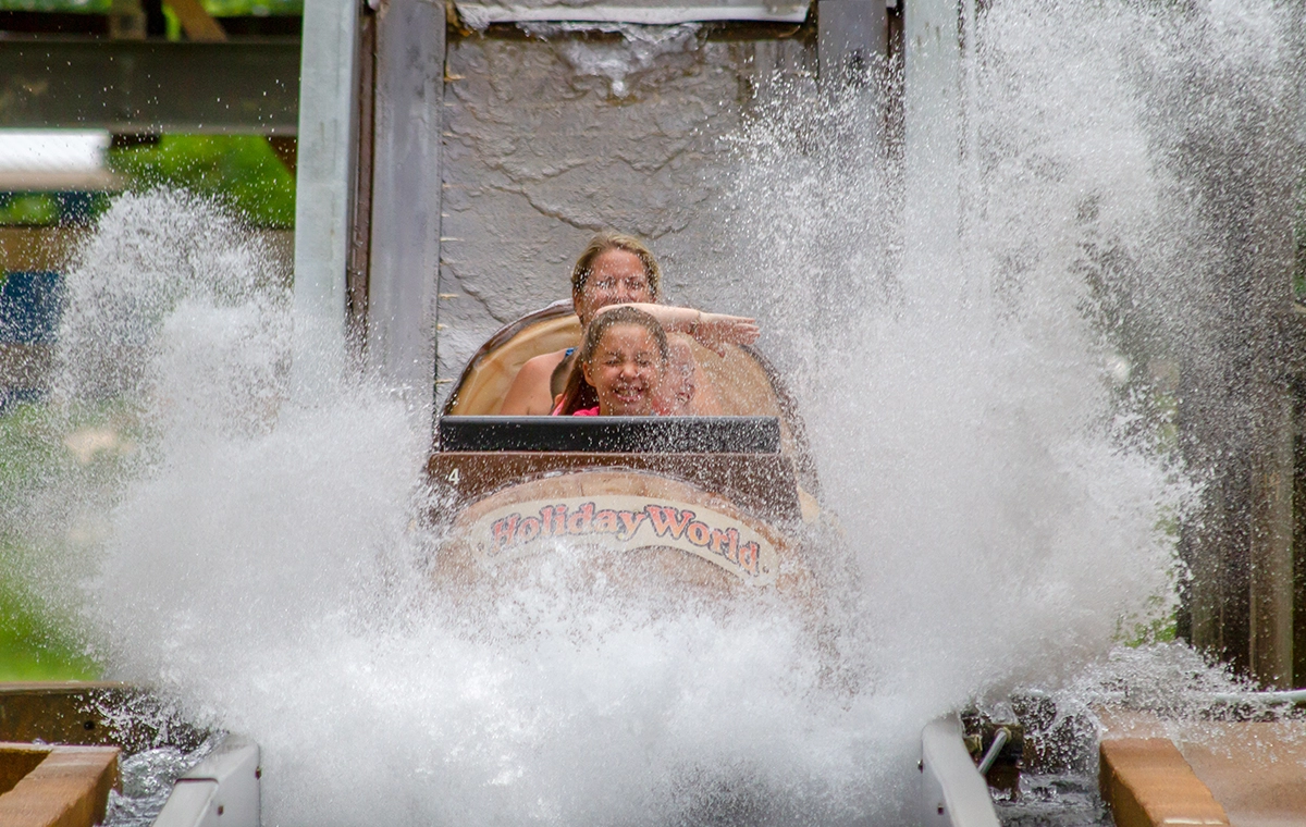 A boat hitting the splashdown of Frightful Falls at Holiday World & Splashin' Safari in Santa Claus, Indiana.