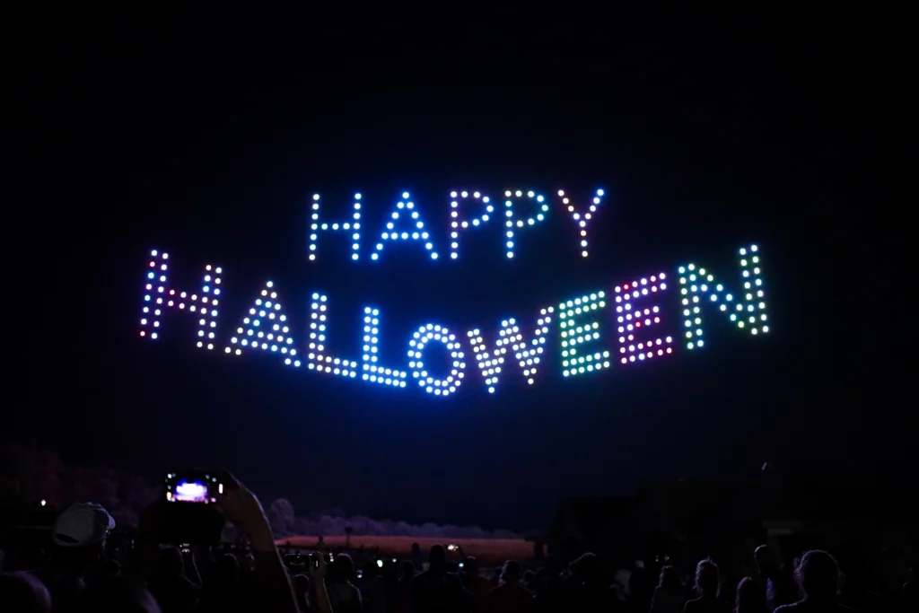 The words "Happy Halloween" made of drones during Halloween in the Sky at Holiday World.