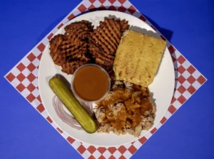 Plate Meal of Pulled Chicken, Sweet Potato Waffle Fries, and Cornbread from Sam's Smokehouse at Holiday World & Splashin' Safari.