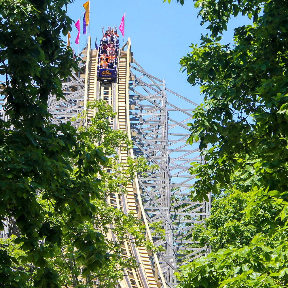 A train begins the first drop of The Legend Wooden Roller Coaster at Holiday World & Splashin' Safari in Santa Claus, Indiana.