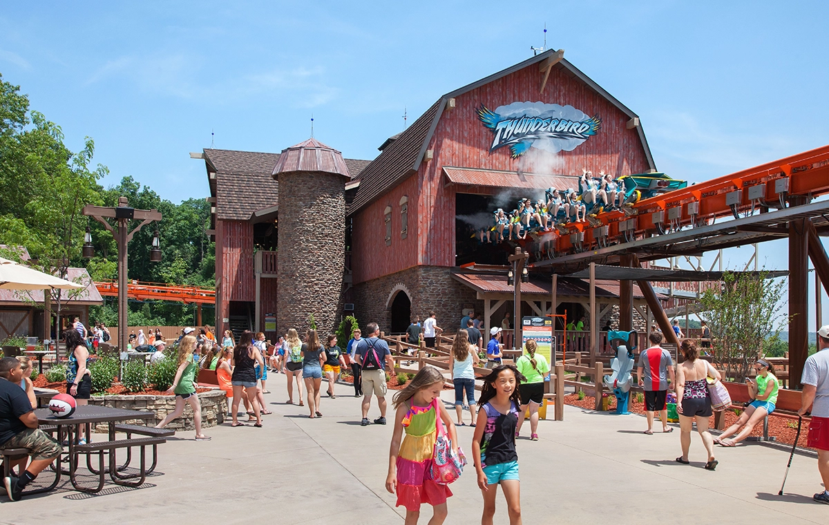 An exterior view of the station building as a train launches on Thunderbird Wing Coaster at Holiday World & Splashin' Safari in Santa Claus, Indiana.