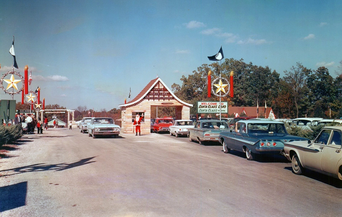 Cars lined up to enter the parking lot of Santa Claus Land in the 1960s.