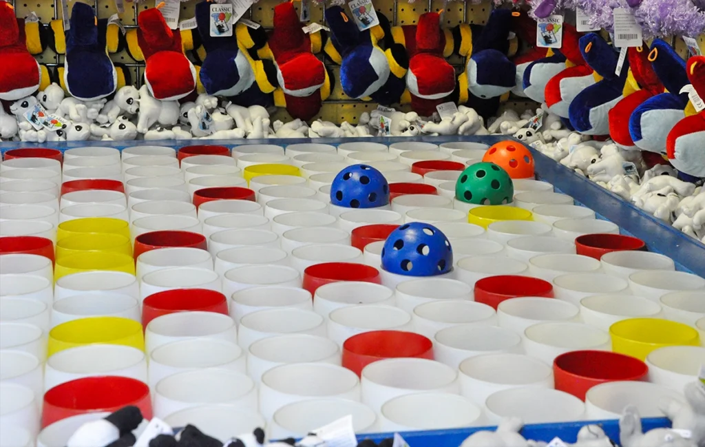 Balls resting in the goblet pitch game, Old Glory, at Holiday World.