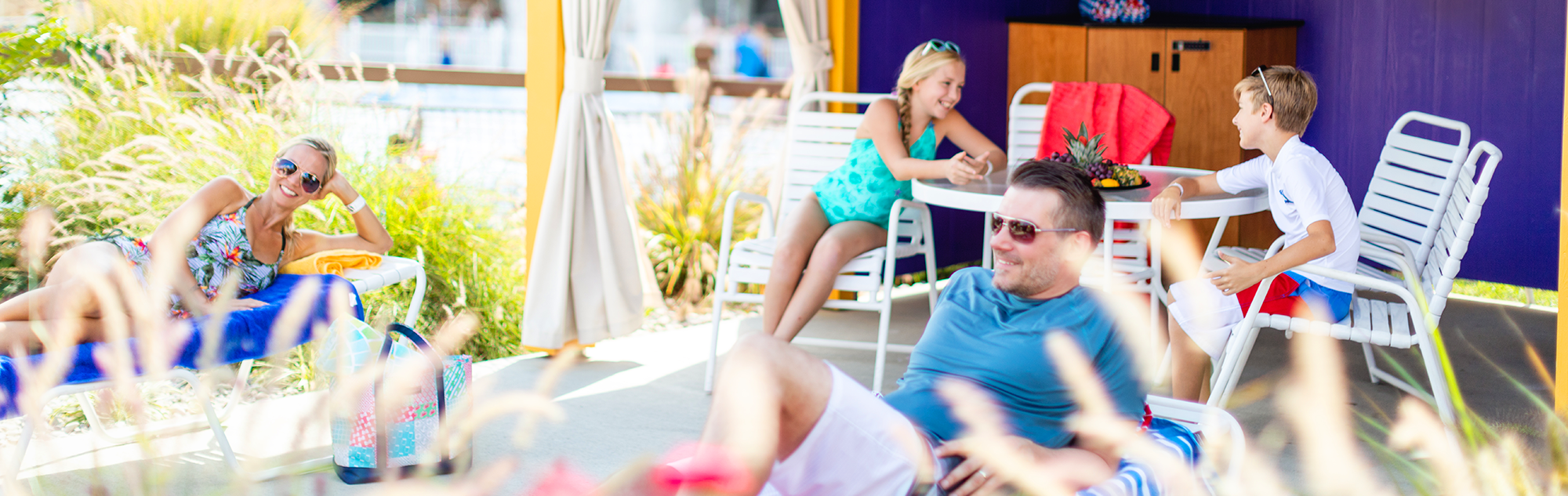 A family relaxes in a Cabana in Splashin' Safari water park.