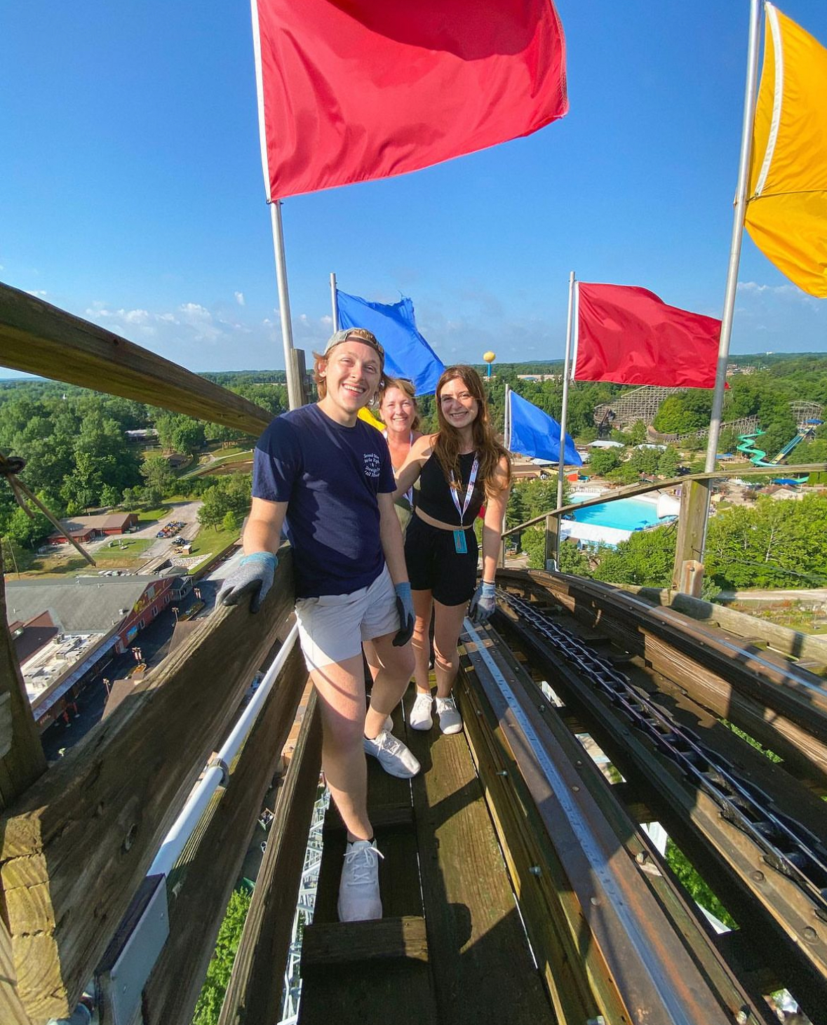 Group takes a selfie on top of the Voyage Lift Hill while on a tour