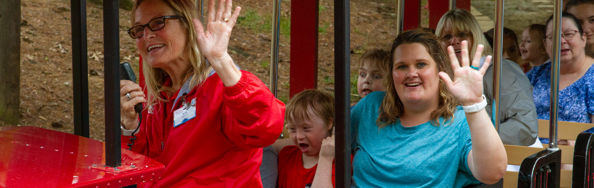 Guests enjoying a ride on Holidog Express during Play Day