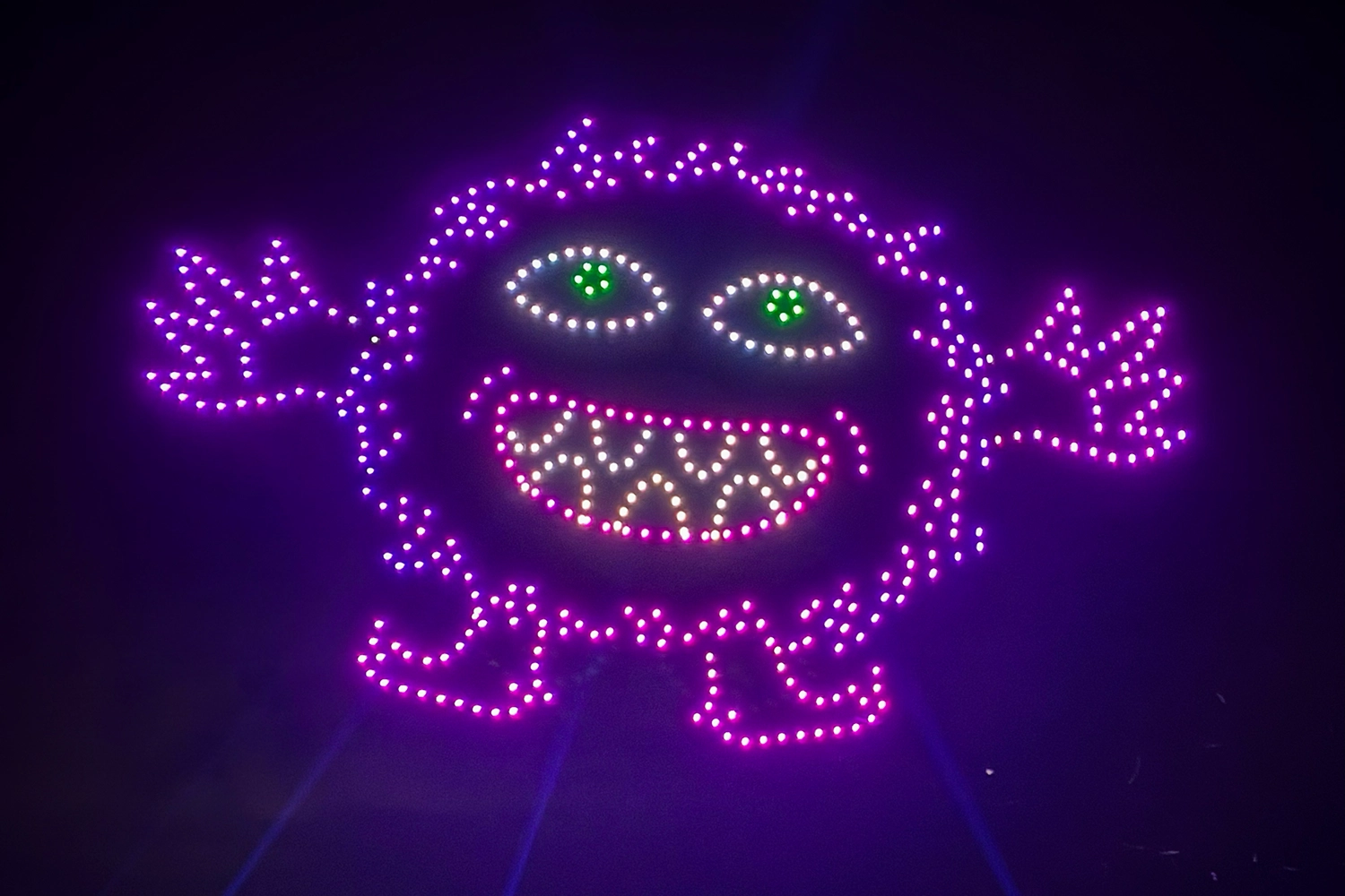 A purple monster formed by drones during Halloween in the Sky at Holiday World.