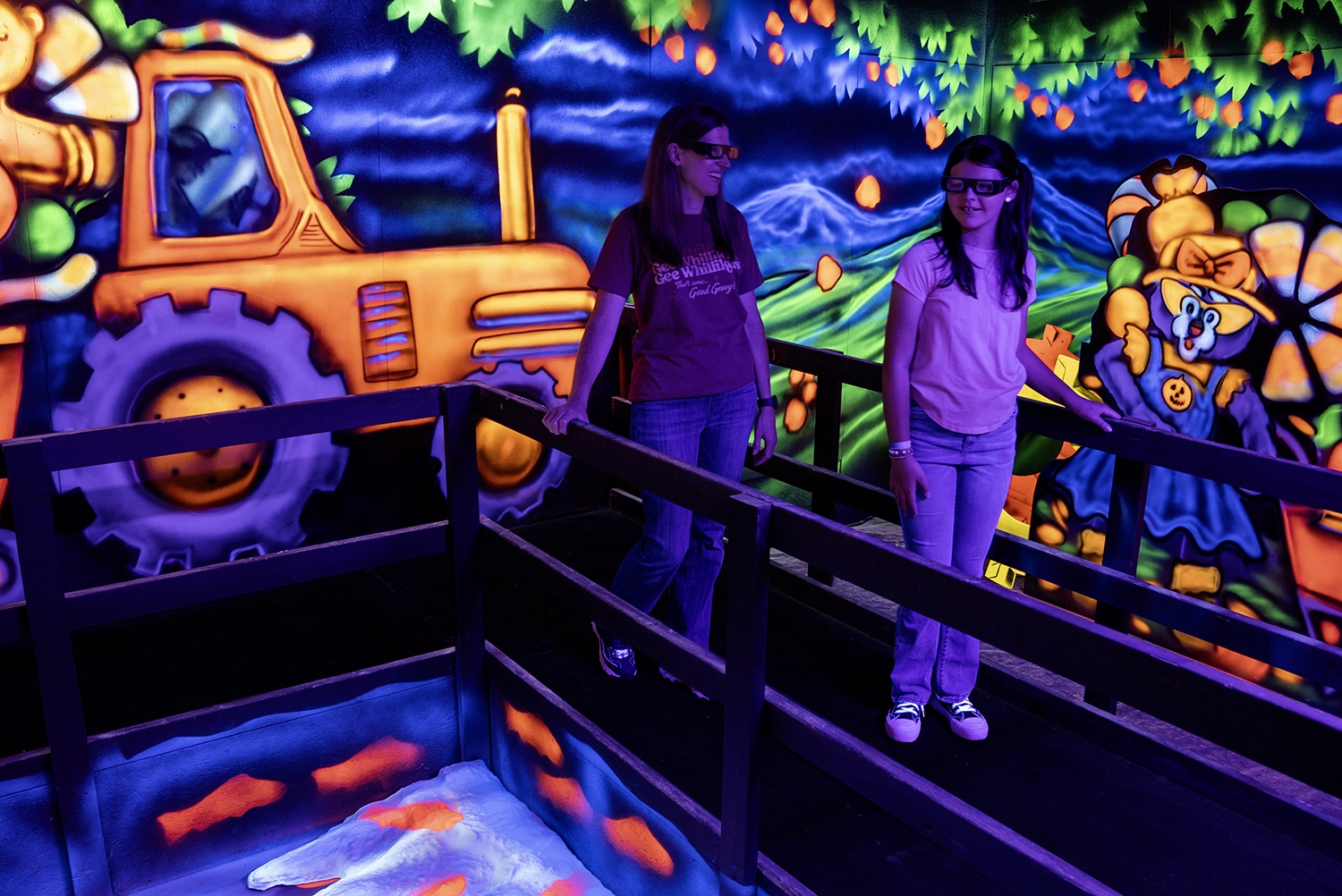 A mom and daughter enjoy Kitty's 3D Candy Farm during Happy Halloween Weekends at Holiday World.