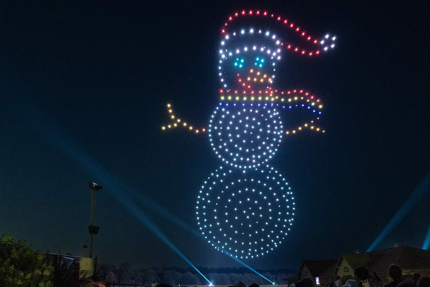 A large, happy snowman during Holidays in the Sky 2024.