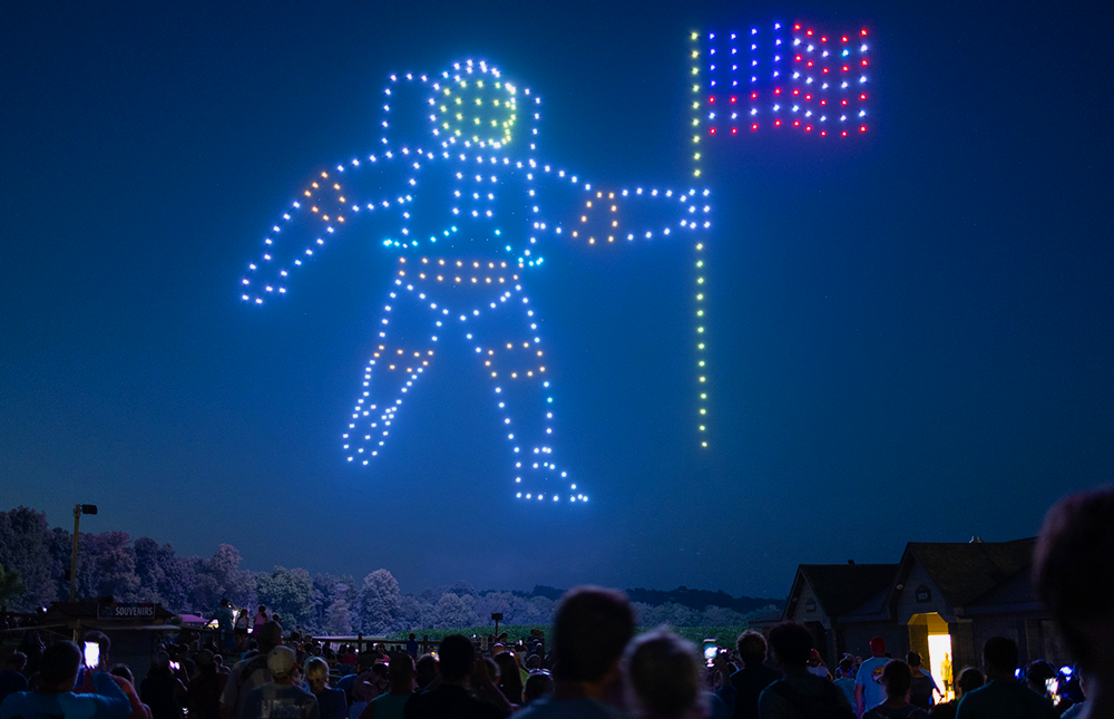 Drones forming an astronaut image for Holidays in the Sky.