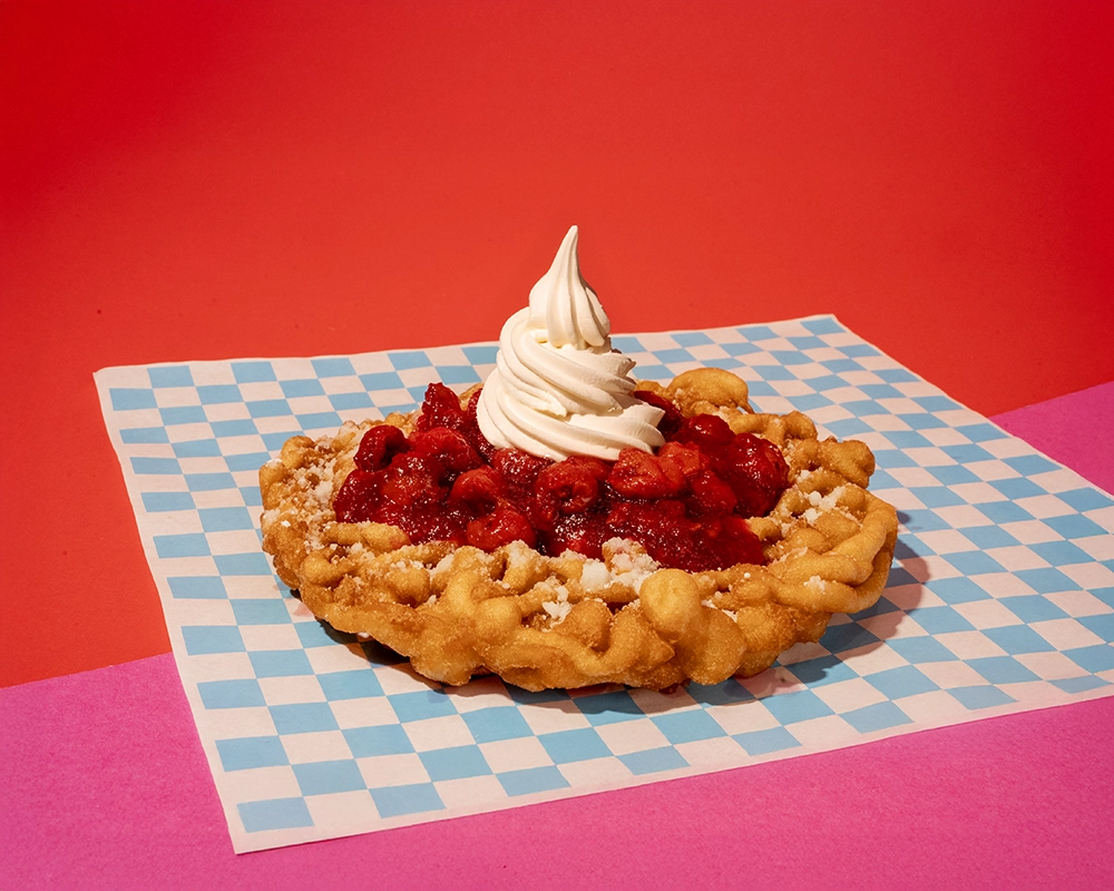 Cherry Cobbler Funnel Cake à la Mode available at Holiday World.