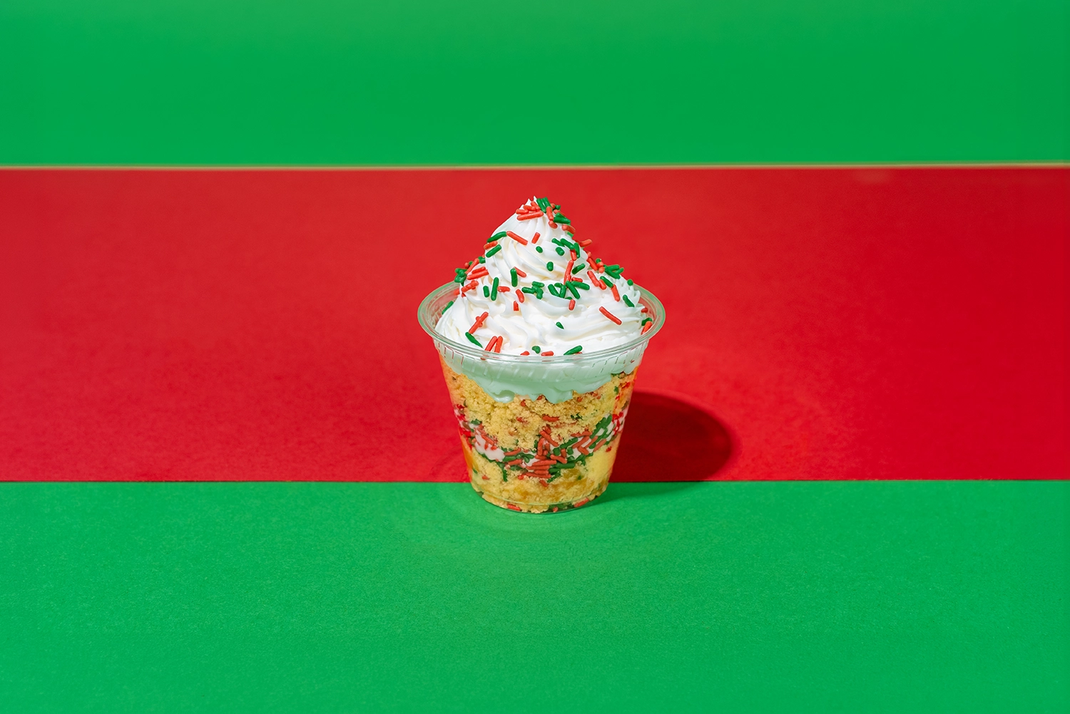 Celebrate Christmas with the Christmas Tree Cake in a Cup at Candy Cane Confectionary in Christmas during the 2026 Summer Wine'd Down Culinary Festival