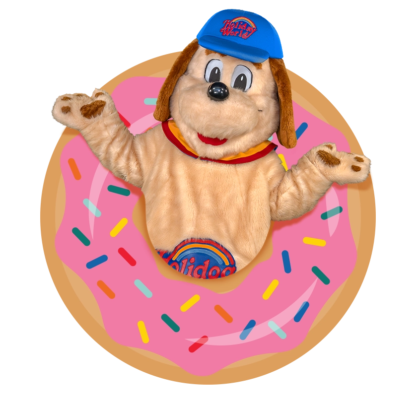 Holidog popping through a donut-decorated pool float.